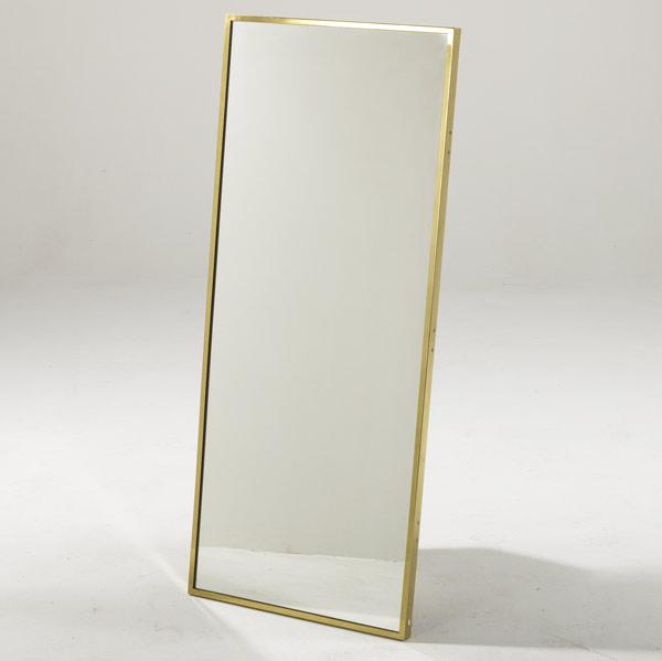 Appraisal: PAUL MCCOBB CALVIN Rectangular wall mirror with brass frame Paul