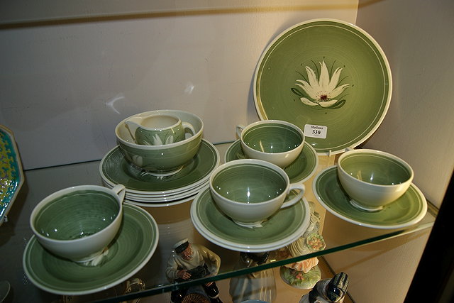 Appraisal: A SUSIE COOPER PART TEA SET of green ground with