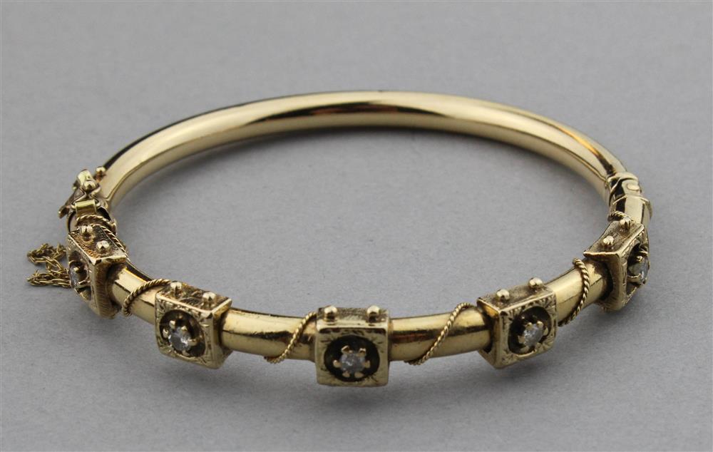 Appraisal: VINTAGE K YELLOW GOLD HINGED BRACELET WITH DIAMONDS the bracelet