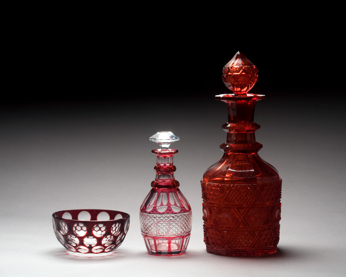 Appraisal: CONTINENTAL RUBY RED CUT-GLASS DECANTER AND STOPPER Together with a