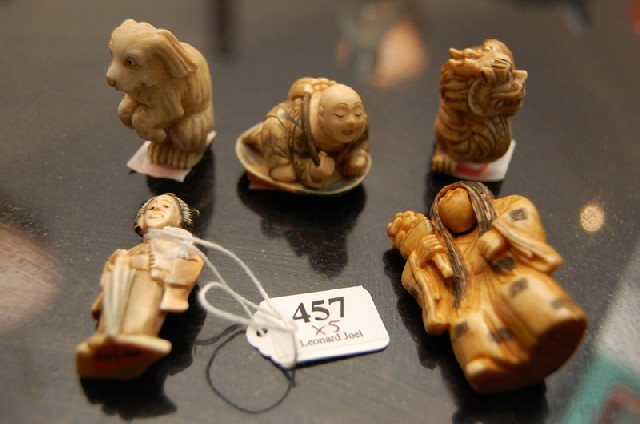 Appraisal: A COLLECTION OF FIVE JAPANESE IVORY NETSUKE Meiji period and