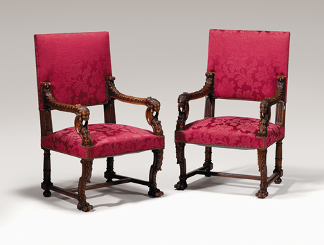 Appraisal: Pair of unusual Renaissance style carved walnut armchairs Each with