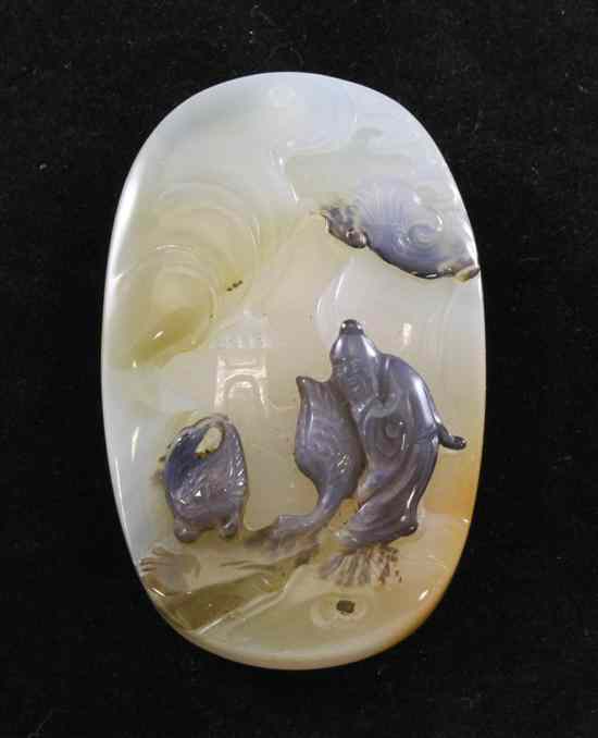 Appraisal: A Chinese Suzhou style agate pendant plaque carved in relief