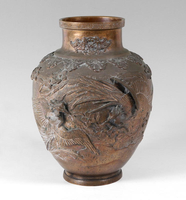 Appraisal: ORIENTAL BRONZE FIGURAL VASE Relief cast with figural birds in