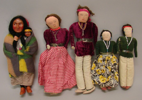 Appraisal: Lot of Native American dolls Marked Skookum female with papoose