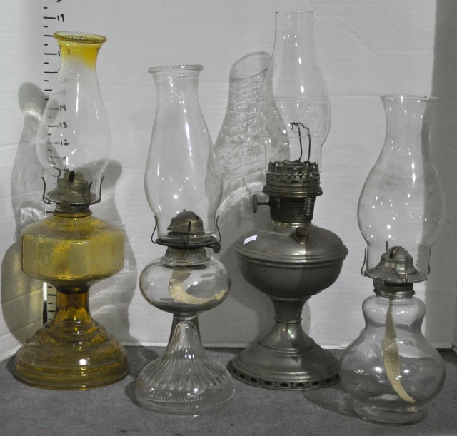 Appraisal: Bx Four Kerosene LampsIncluding one nickle-plate Aladdin lamp