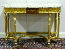 Appraisal: A Regency style marble topped gilt wood console table cm