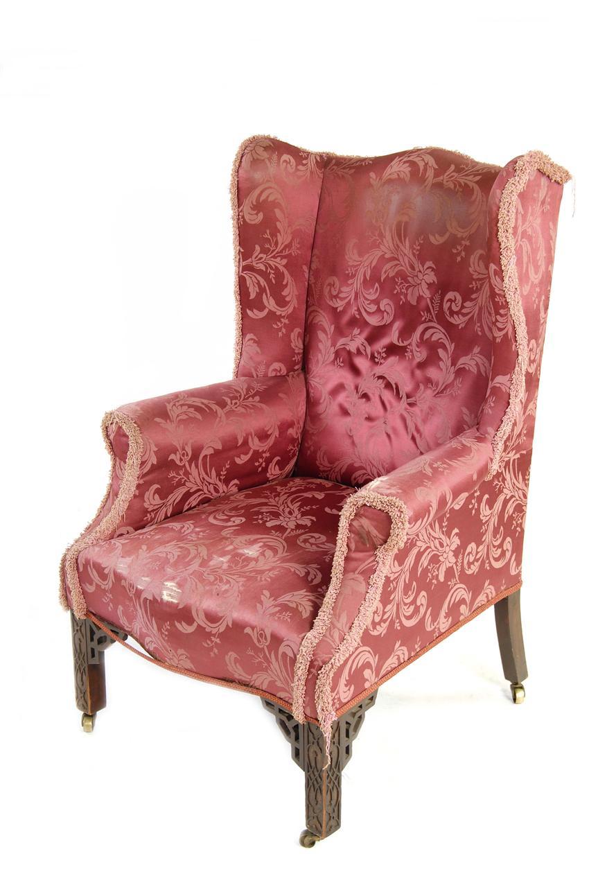 Appraisal: A mahogany wing armchair in George III style