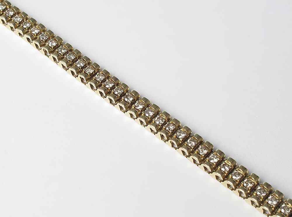 Appraisal: CTW DIAMOND TENNIS BRACELET K yellow gold bracelet contains round