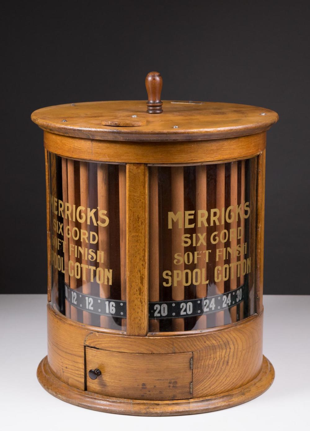 Appraisal: CYLINDRICAL OAK AND CURVED GLASS SPOOL CABINET Merrick Thread Co