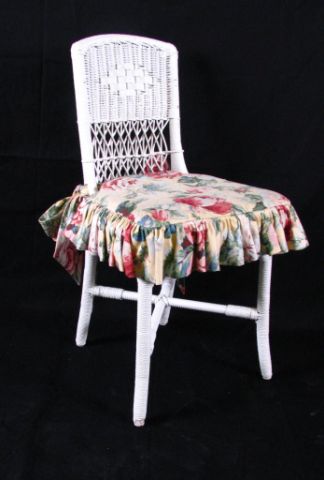 Appraisal: Eight Wicker Side Chairs with Chintz Cushions