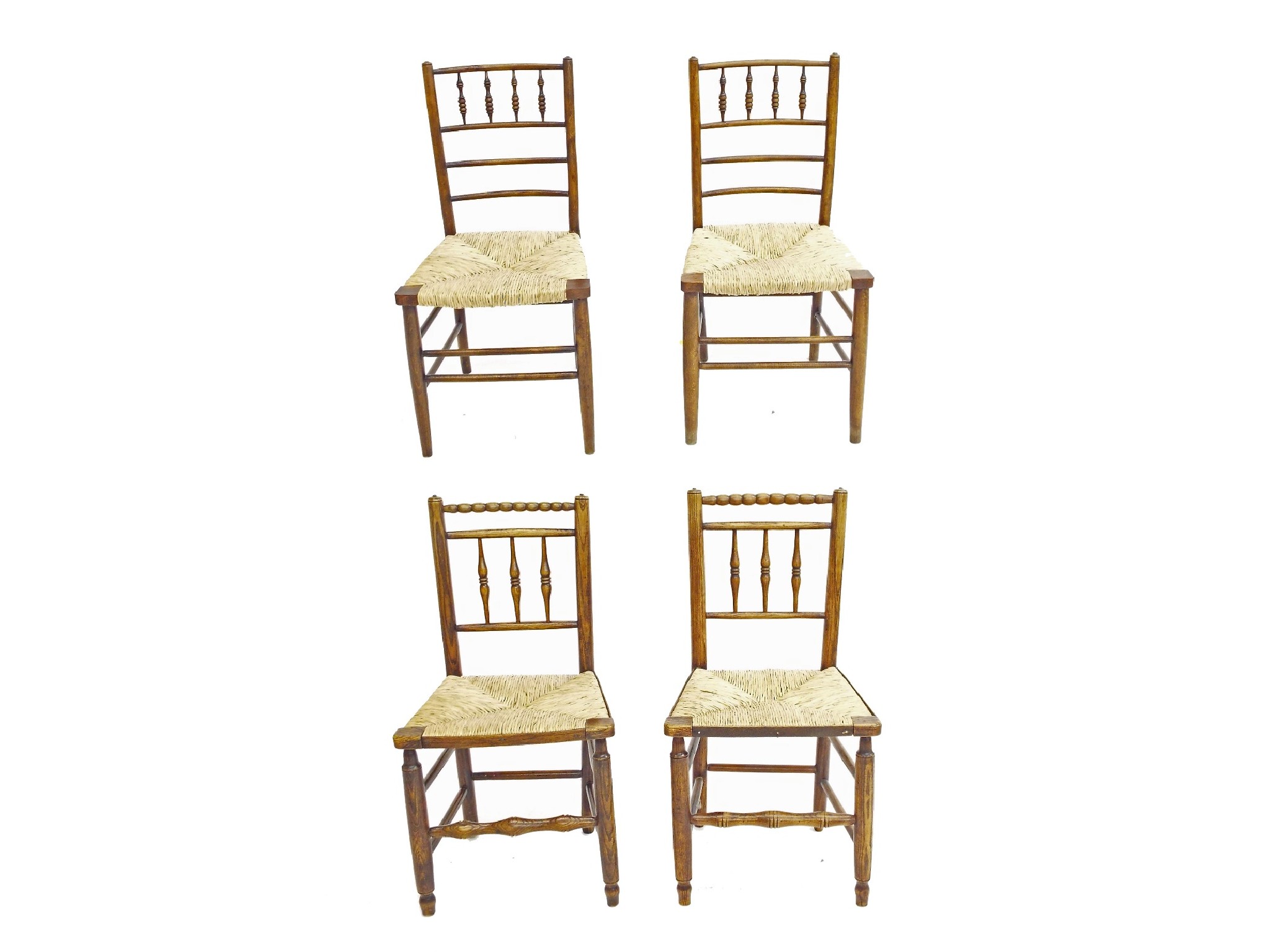 Appraisal: Two pairs of bobbin back rush seat chairs