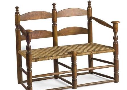 Appraisal: AMERICAN MAPLE DOUBLE CHAIR-BACK WAGON SEAT The turned stiles with