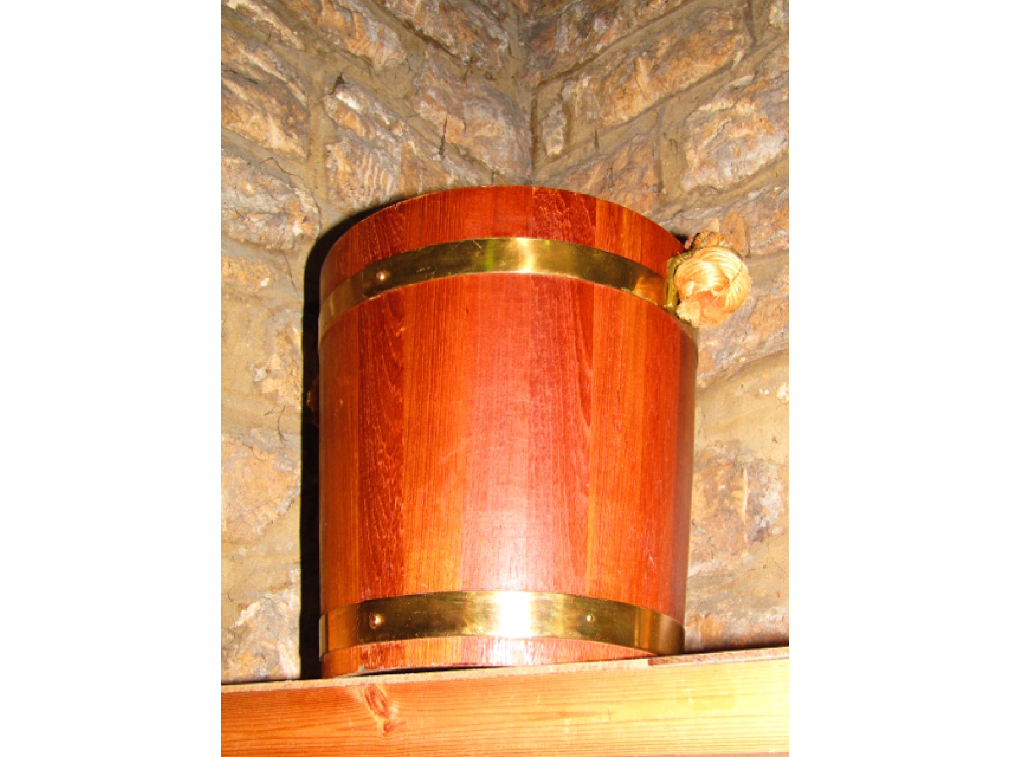 Appraisal: A good quality coopered timber pail with brass banding and