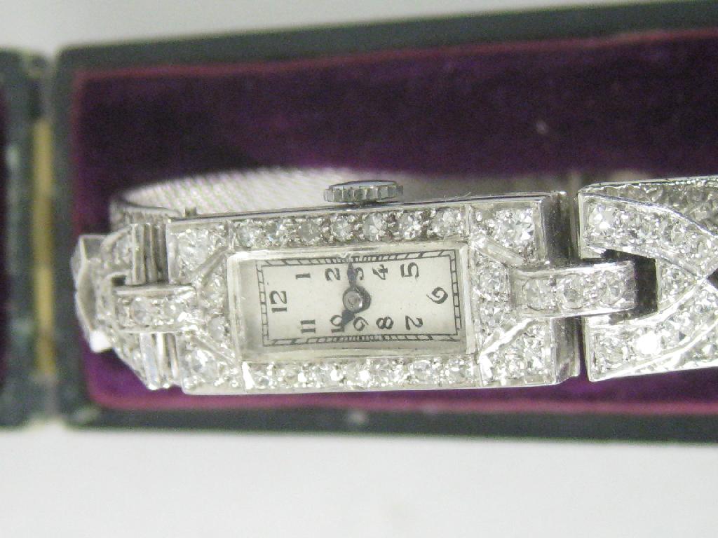 Appraisal: An Art Deco style Cocktail Watch pave set numerous diamonds