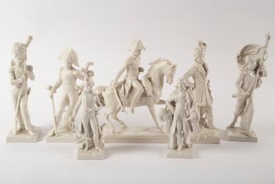 Appraisal: A group of German white glaze figures of soldiers mid