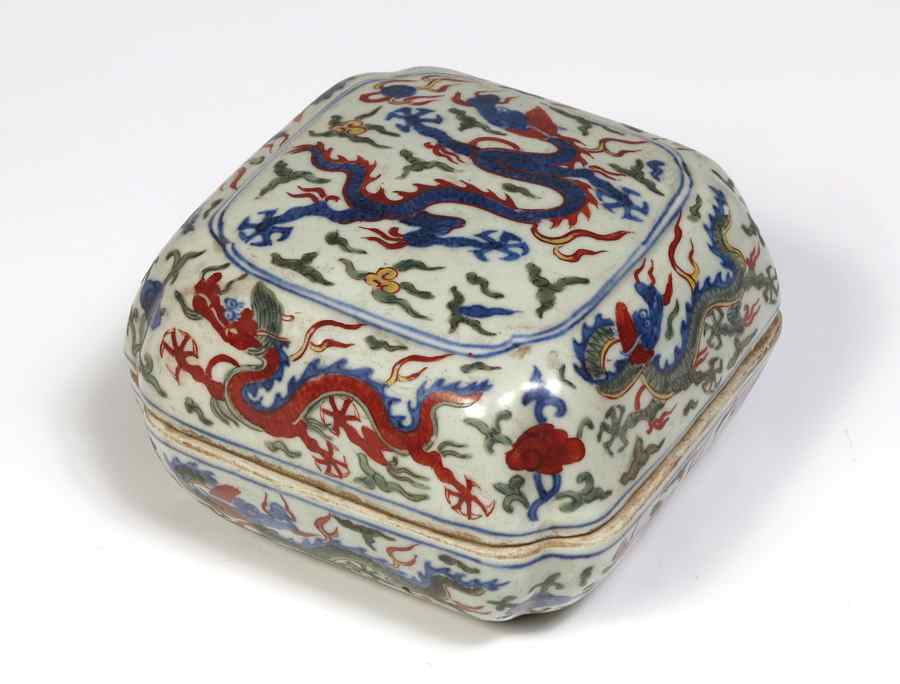 Appraisal: CHINESE POLYCHROME CERAMIC COVERED BOX Four color dragon decorated covered