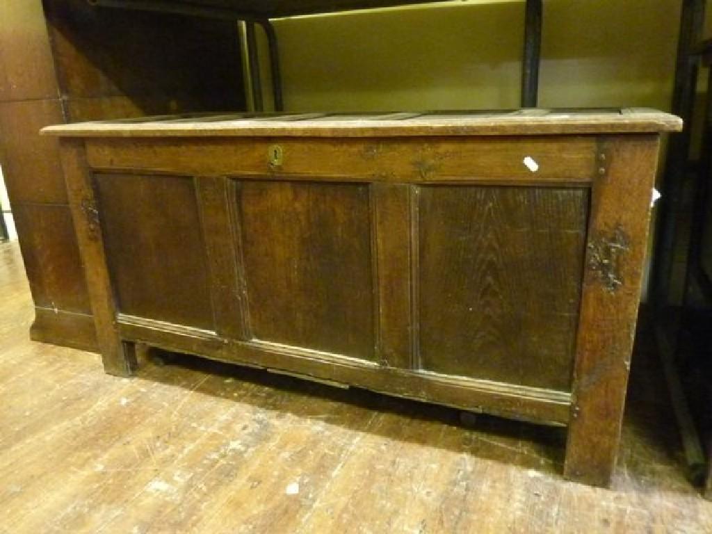 Appraisal: An th century oak and elm coffer with panelled frame