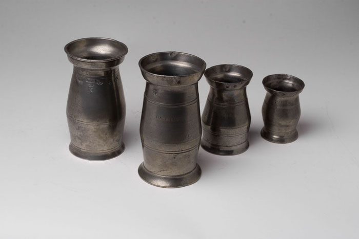 Appraisal: ASSEMBLED SET OF FOUR PEWTER MEASURES ENGLISH OR POSSIBLY IRISH