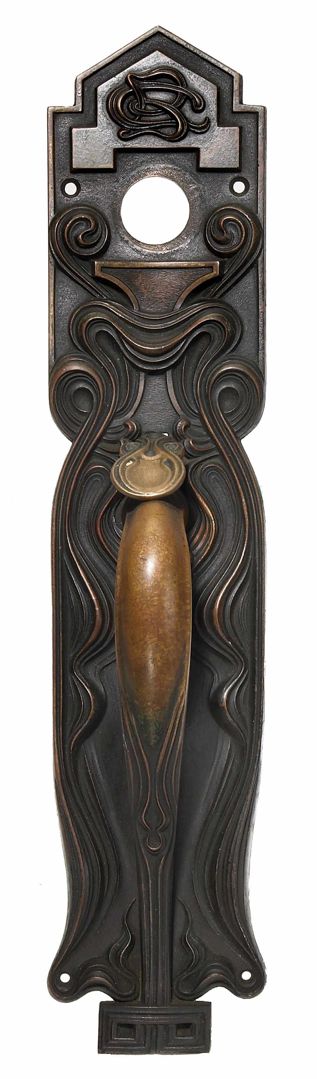 Appraisal: A Continental Art Nouveau bronze door handle and backplate circa