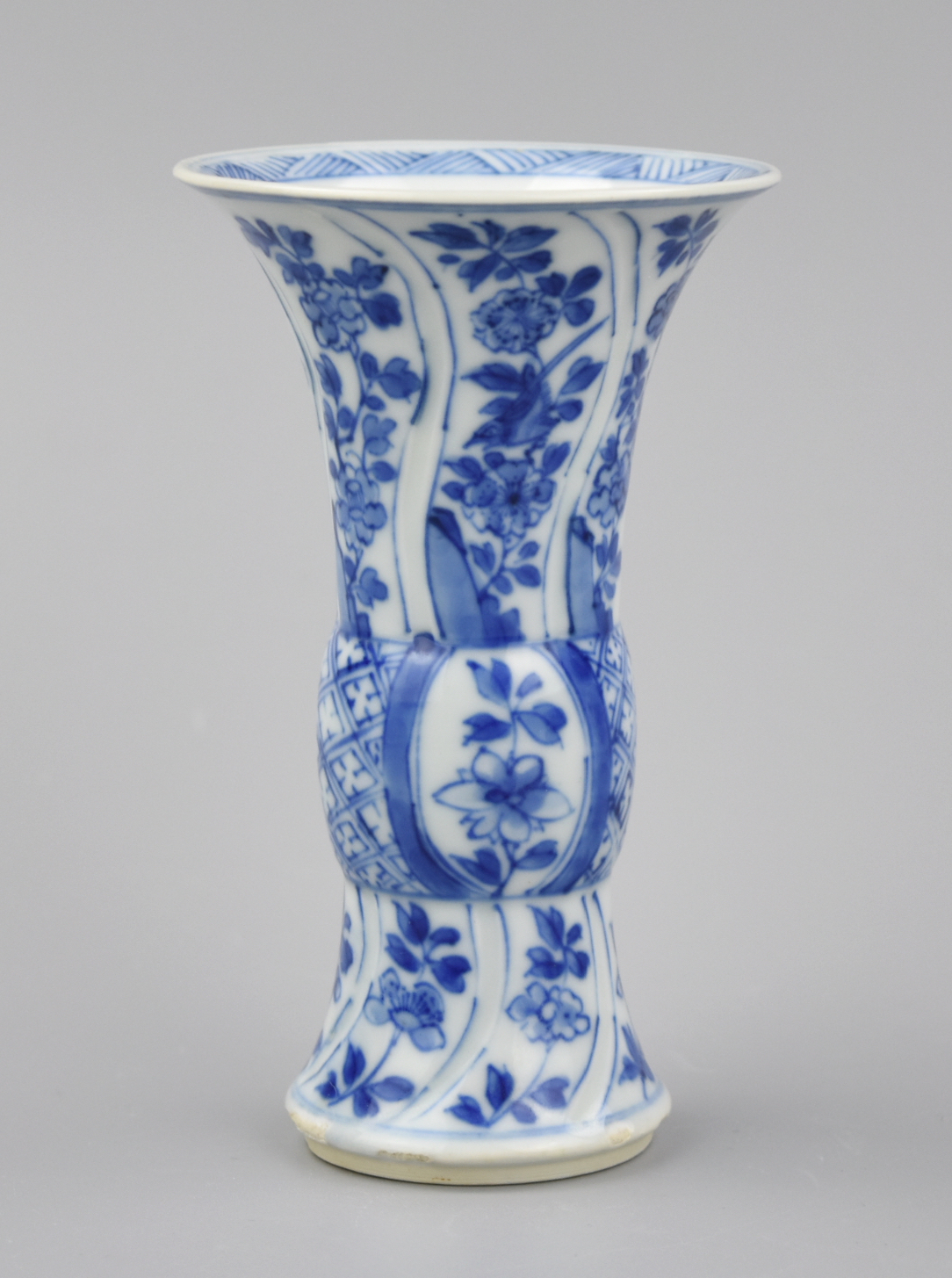 Appraisal: SMALL BLUE WHITE GU VASE W FLOWER KANGXI PERIOD Chinese