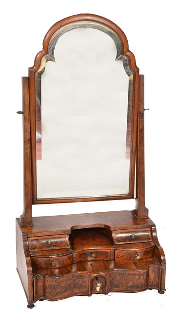 Appraisal: AN TH CENTURY WALNUT VENEERED TOILET MIRROR with domed and