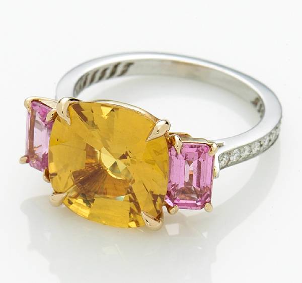 Appraisal: A yellow sapphire pink sapphire and diamond ring centering a