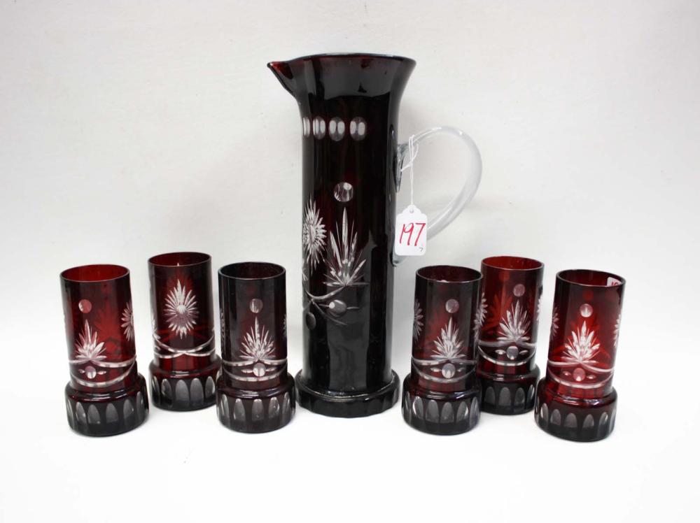 Appraisal: RUBY RED CUT TO CLEAR CRYSTAL BARWARE SET pieces comprised