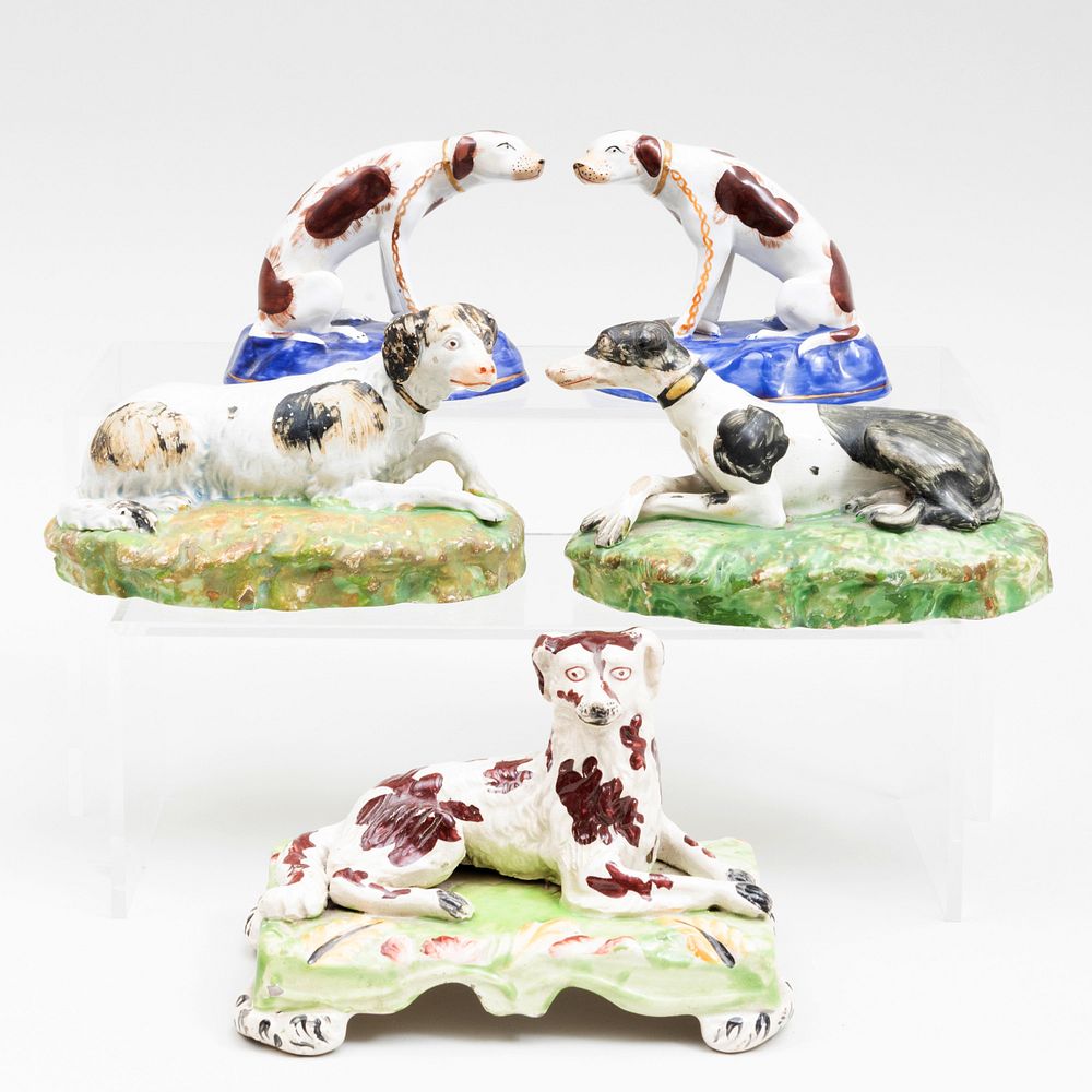 Appraisal: Group of Three Staffordshire Models of Hounds Together with a