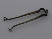 Appraisal: An unusual pair of tongs with thread edge shaped as