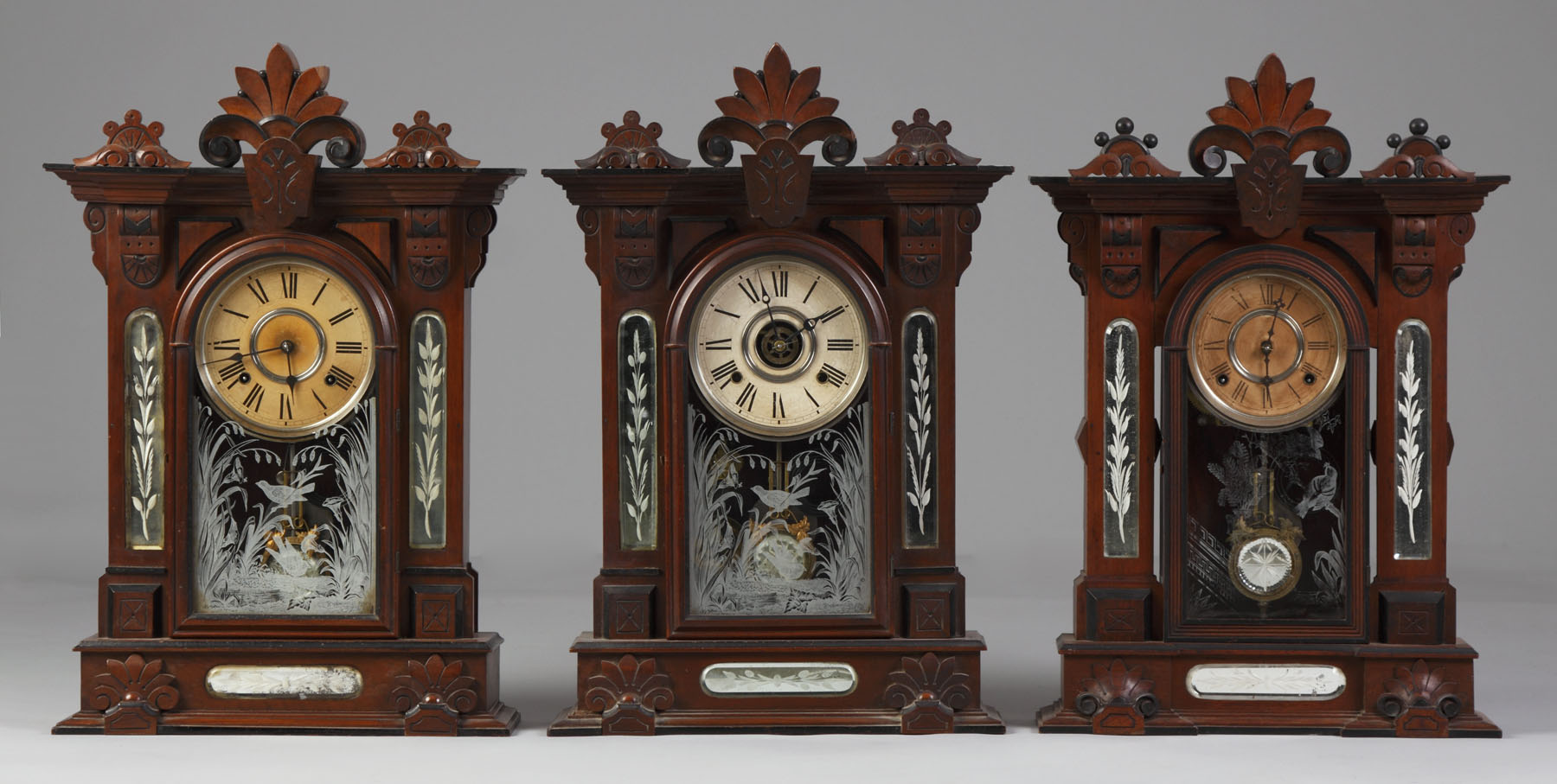 Appraisal: L - Gilbert Amphion Carved walnut case with ebonized highlights