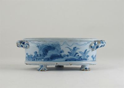 Appraisal: An oval Delftware three-footed bowl probably Brislington with rope twist