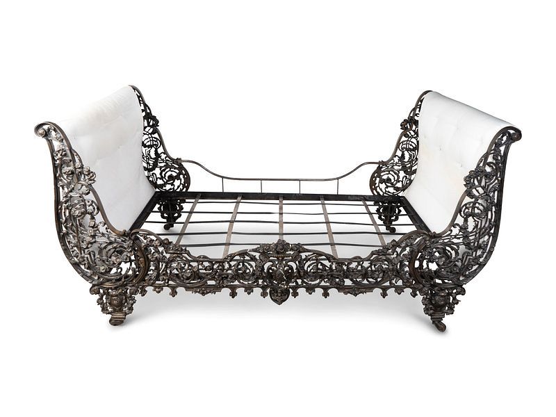 Appraisal: A Continental Cast Iron Sleigh Daybed Height x width x