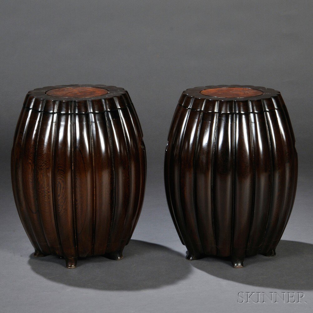 Appraisal: Pair of Wood Storage Stools China barrel-shape each with ribbed