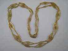 Appraisal: A French hallmarked carat gold long guard chain approx cm