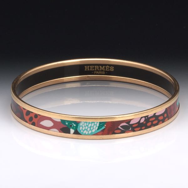 Appraisal: HERMES JUNGLE OF EDEN NARROW ENAMEL BANGLE Narrow bangle in