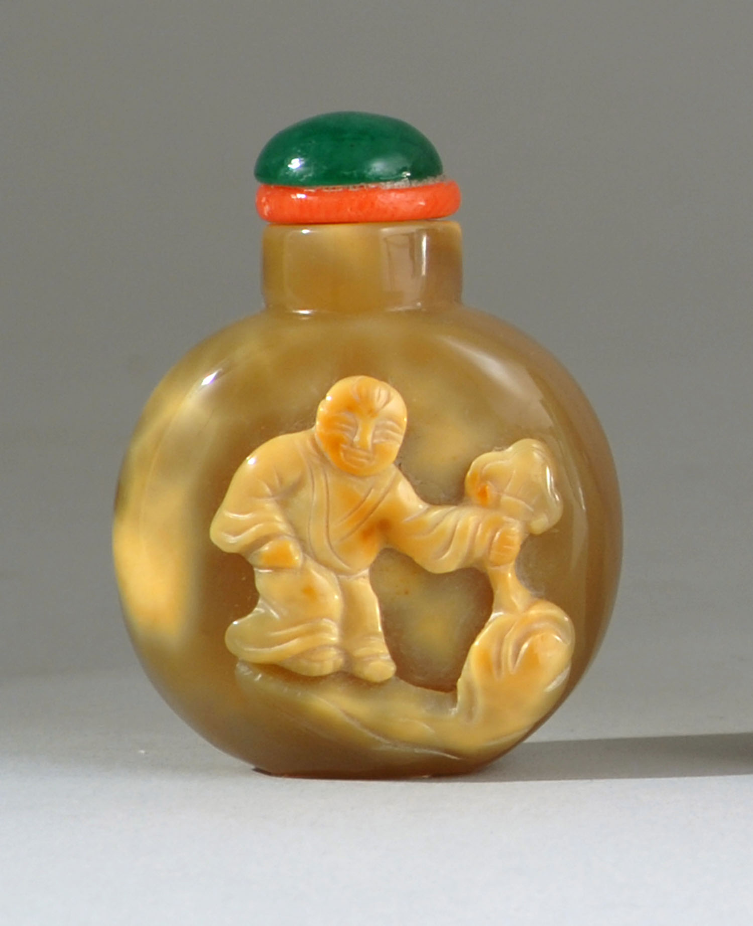 Appraisal: MINIATURE AGATE SNUFF BOTTLE Circa In ovoid form With cameo