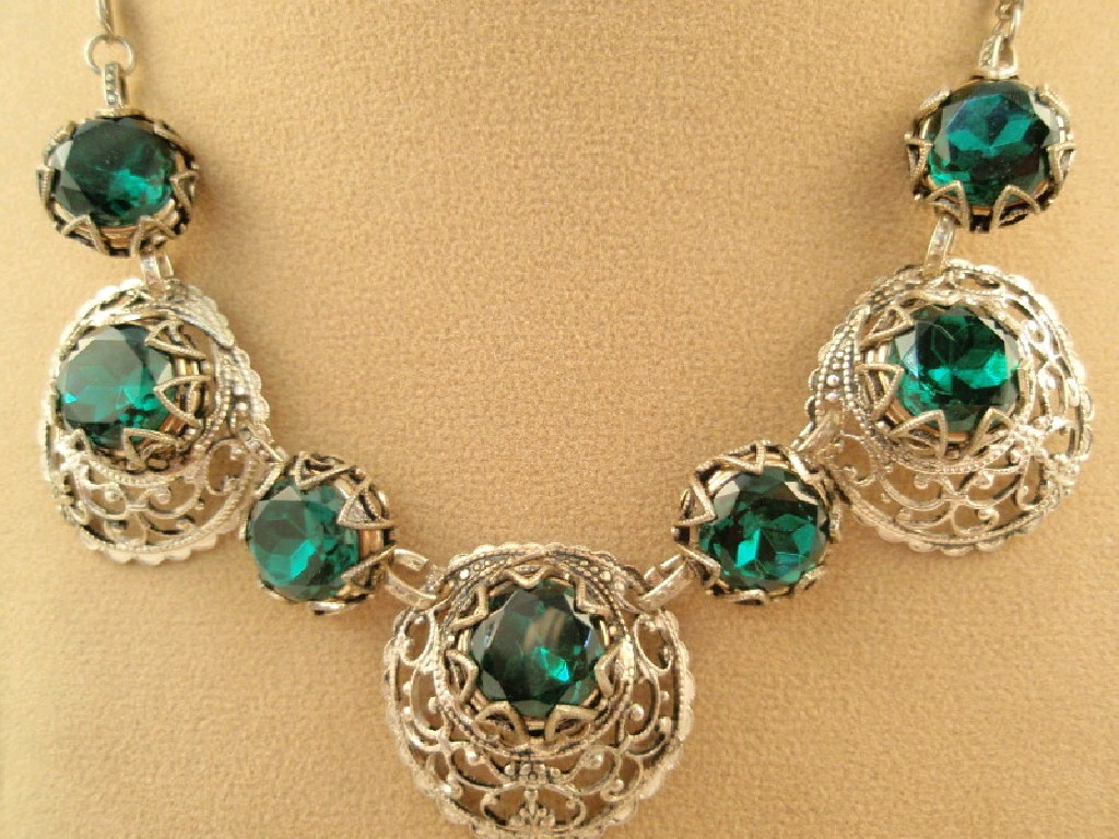 Appraisal: A white metal and green stone necklace