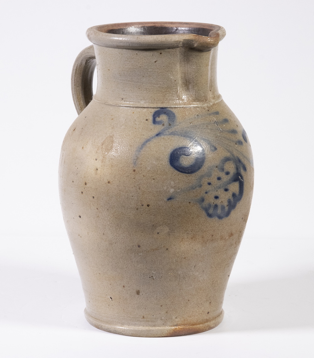 Appraisal: DECORATED OVOID STONEWARE PITCHER Mid- th c One-Gallon Salt Glazed