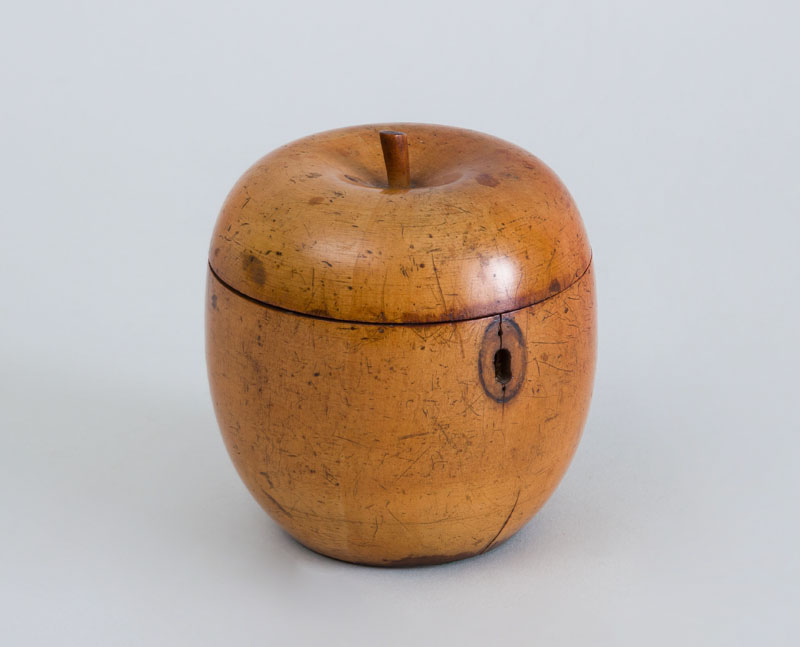 Appraisal: GEORGE III FRUITWOOD APPLE-FORM TEA CADDY The hinged lid opening