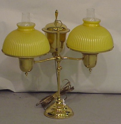 Appraisal: Brass double student lamp c with ribbed yellow glass shades