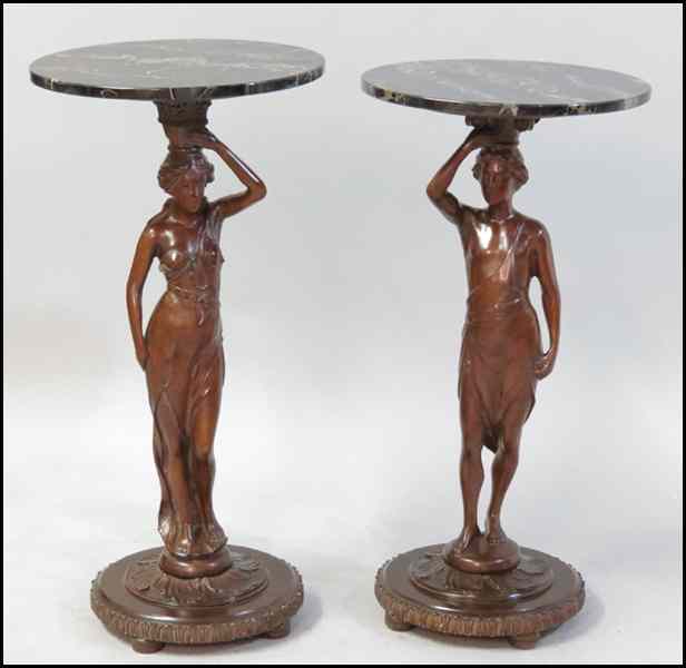 Appraisal: PAIR OF CARVED MAHOGANY FIGURAL PEDESTALS Both with round black