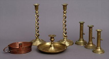 Appraisal: FIVE BRASS CANDLESTICKS AND TWO CHAMBERSTICKS Including a pair of