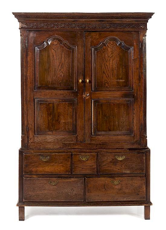 Appraisal: A George III Provincial Oak Linen Press Height x width