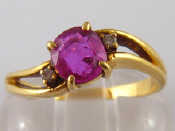 Appraisal: An carat gold ruby and diamond ring ruby approx mm