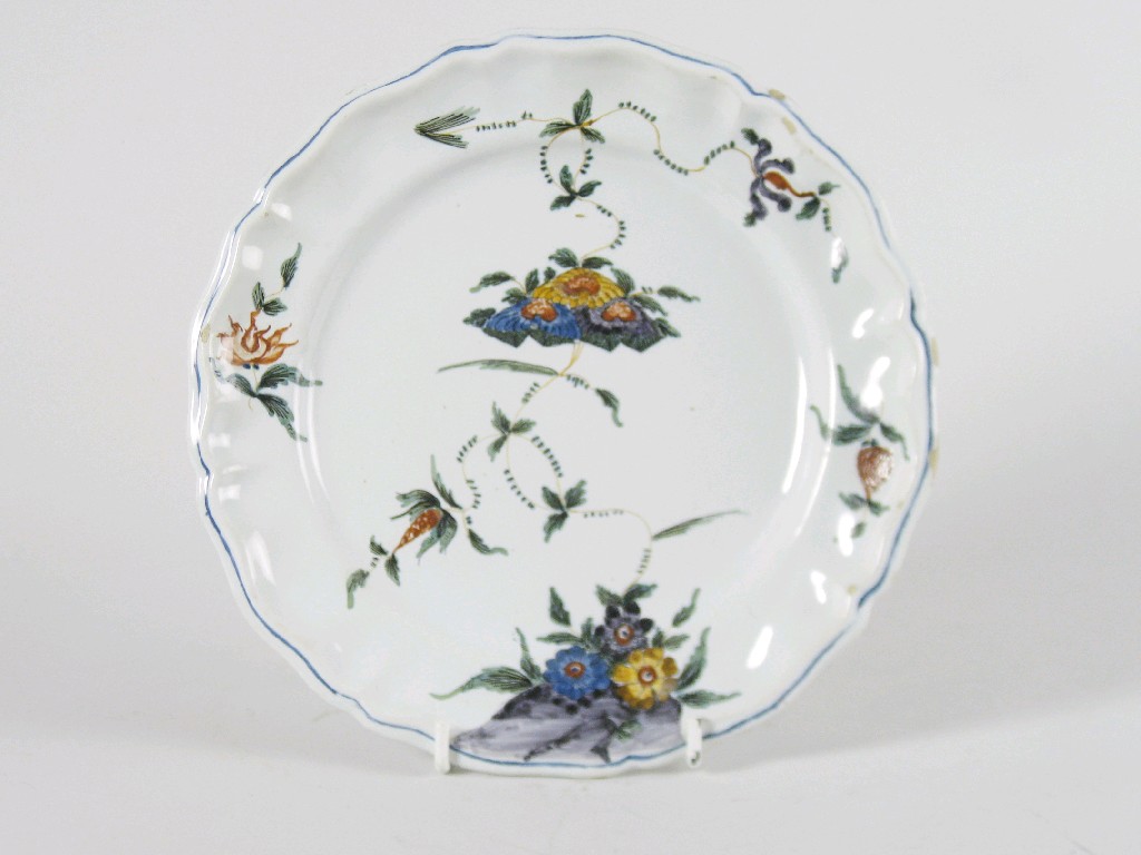 Appraisal: A late th Century French faince polychrome Plate painted flowers