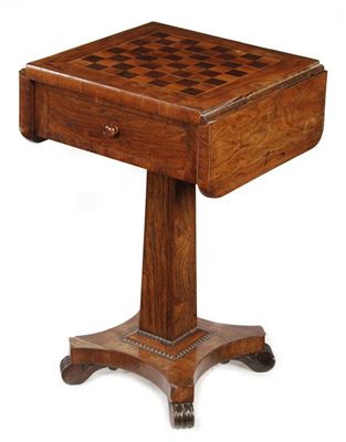 Appraisal: A Victorian rosewood and yew wood pedestal games table the