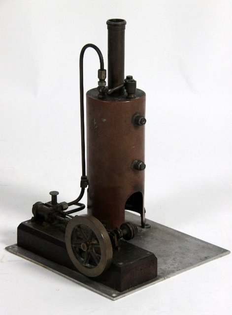 Appraisal: A standing spirit fired steam engine with attached piston cm