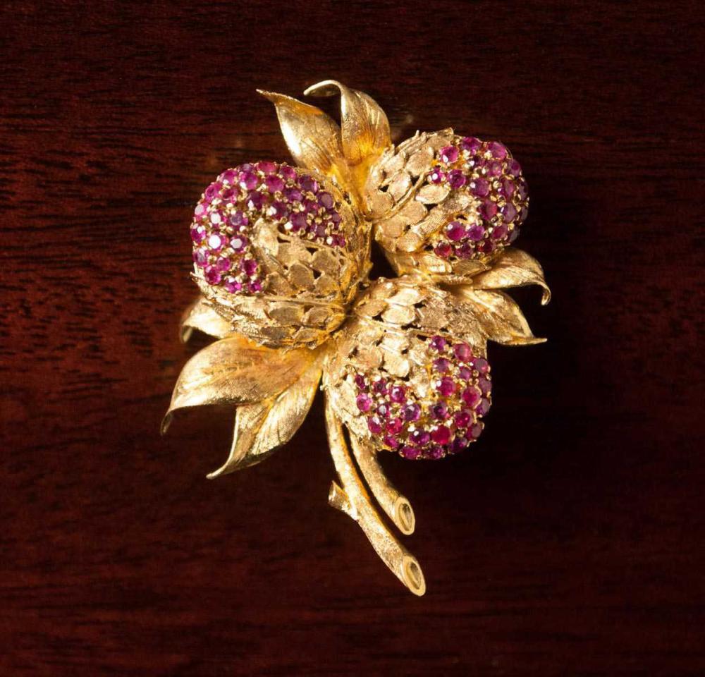 Appraisal: ITALIAN RUBY AND EIGHTEEN KARAT GOLD RASPBERRIES BROOCH featuring three