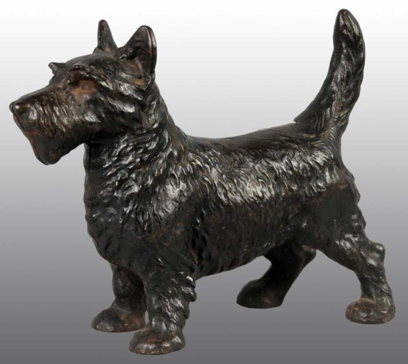 Appraisal: Cast Iron Standing Scottie Doorstop Description Made by Hubley cat